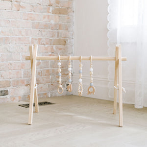 Wooden Baby Gym + Gray and White Toys