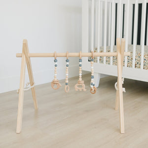 Wooden Baby Gym + Gray Toys