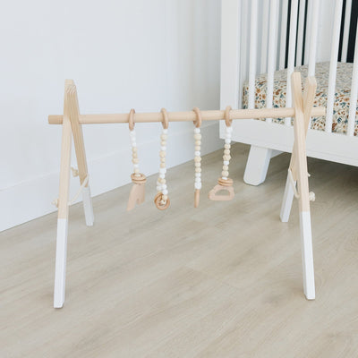 Wooden Baby Gym + White Toys